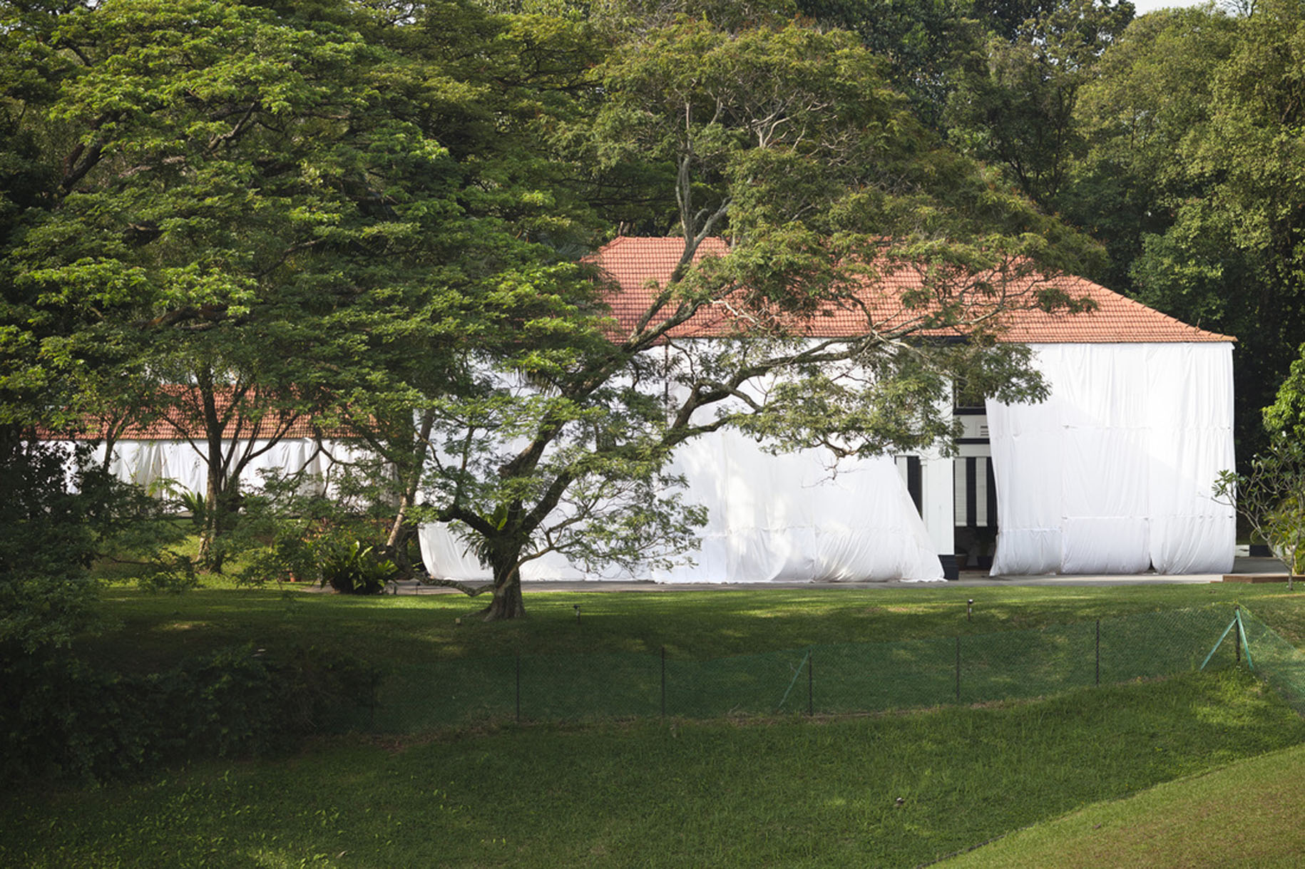 <p>Image from series <em>This city by any other name (Would smell just as white)</em> (2012 – Ongoing) by Geraldine Kang</p>
<p><em>This city by any other name (Would smell just as white)</em> is a series of abstract contemplations on space and land usage in Singapore. Each image contains an intervention and also an element of white. The colour white was chosen for its varying (and contrasting) connotations, and inescapably, for its political associations with the State. A broader understanding of the forces negotiating social space is evoked, and underlying that, a consideration of the very ideas of progress, home and our relationship with land itself.</p>
